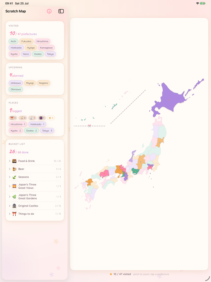 Scratch Map on iPad showing the journal sidebar beside the map